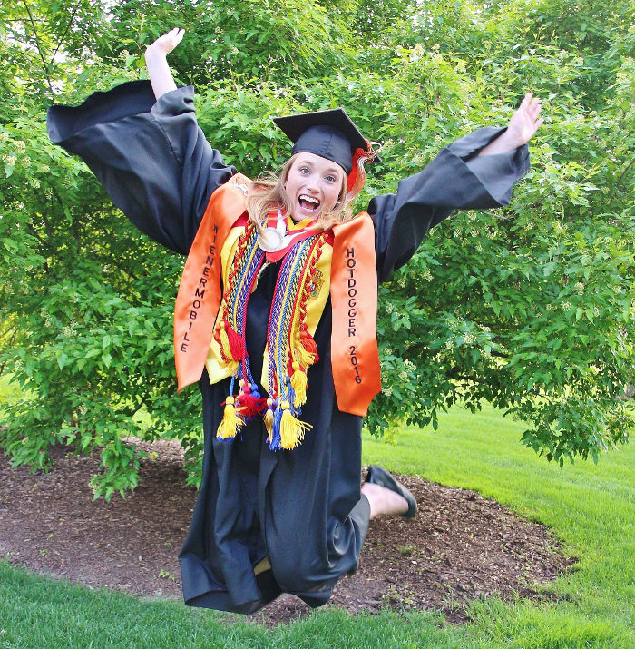 UPDS Logistics Service Representative Ashley Eisert celebrates her graduation from UNO — and her next adventure driving the Oscar Mayer Wienermobile.